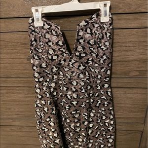 Size- L- runs small- Cheetah print party dress- tagged- never worn